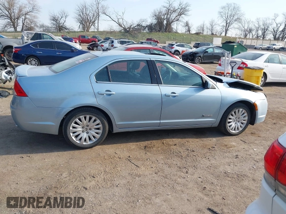 2010 Mercury Milan Hybrid z VIN 3MEDM0L33AR660979, wystawiony jako IAAI lot #41994618 z przebiegiem 114 007 mil mil oraz . Historia ofert i sprzedaży dostępna na DreamBid. Obrazek 14.