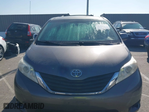 2014 Toyota Sienna LE AAS with VIN 5TDKK3DC6ES521706, listed as a IAAI auction lot 41999188 with 104,867 mi miles. Bid and sale history available at carsss.com. Image 12.