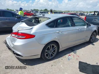2017 Ford Fusion Hybrid SE with VIN 3FA6P0LU4HR234101, listed as a IAAI auction lot 42579447 with 169,273 mi miles and . Bid and sale history available at DreamBid. Image 4.