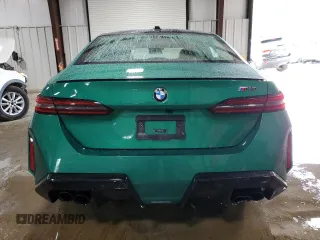 2025 BMW M5 z VIN WBS83FK04SCT95434, wystawiony jako Copart lot #56969865 z przebiegiem Nie podano mil oraz Szkody całkowita. Historia ofert i sprzedaży dostępna na DreamBid. Obrazek 6.