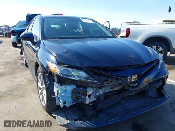 2020 Toyota Camry LE with VIN 4T1L11AKXLU999381, listed as a IAAI auction lot 41782771 with 58,526 mi miles. Bid and sale history available at carsss.com. Image 6.