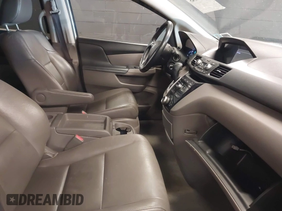 2013 Honda Odyssey EX-L with VIN 5FNRL5H66DB071151, listed as a IAAI auction lot 41914345 with 194,804 mi miles and . Bid and sale history available at carsss.com. Image 5.