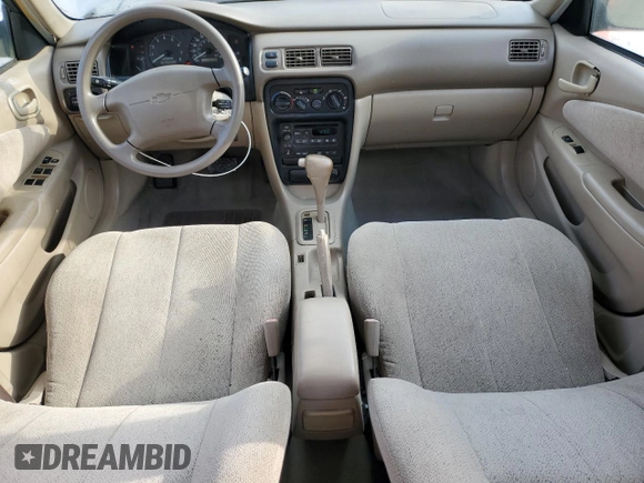 2002 Chevrolet Prizm с VIN 1Y1SK52872Z402630, выставлен на аукционе Copart как лот 53581255 с пробегом 98 104 миль миль и Списание • Salvage title. История ставок и продаж доступна на DreamBid. Изображение 8.
