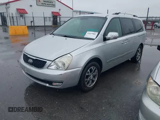 2014 Kia Sedona EX with VIN KNDMH4C76E6541200, listed as a IAAI auction lot 41657002 with 141,377 mi miles. Bid and sale history available at carsss.com. Image 2.