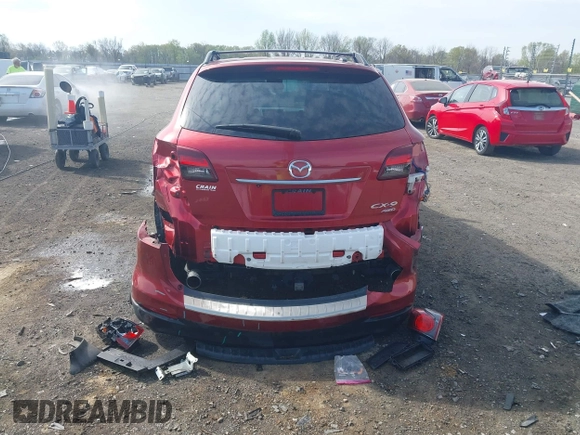 2015 Mazda CX-9 Grand Touring with VIN JM3TB3DA7F0448943, listed as a IAAI auction lot 41888414 with 104,052 mi miles. Bid and sale history available at carsss.com. Image 16.