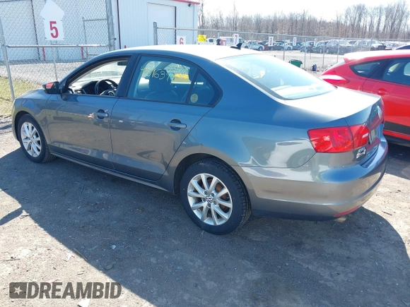 2011 Volkswagen Jetta SE with VIN 3VWBZ7AJ1BM027204, listed as a IAAI auction lot 41816349 with 152,028 mi miles and . Bid and sale history available at DreamBid. Image 3.