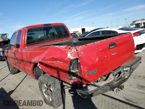 2004 Ford F-250 XL with VIN 1FTNX20P04EB98825, listed as a Copart auction lot 79729074 with 176,099 mi miles and Salvage title. Bid and sale history available at DreamBid. Image 2.