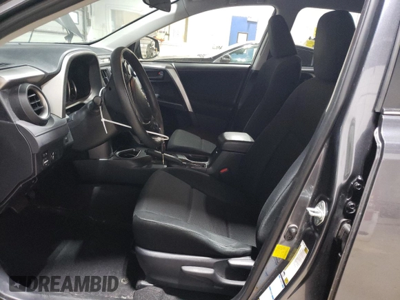 2016 Toyota RAV4 LE with VIN JTMBFREV3GD195188, listed as a Copart auction lot 52217295 with 113,808 mi miles and Salvage Title. Bid and sale history available at DreamBid. Image 7.