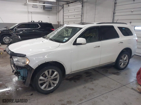2013 Dodge Durango Crew with VIN 1C4SDJDT1DC540680, listed as a IAAI auction lot 41649262 with 106,016 mi miles. Bid and sale history available at carsss.com. Image 18.