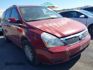 2012 Kia Sedona LX with VIN KNDMG4C70C6443649, listed as a IAAI auction lot 41662007 with 208,575 mi miles. Bid and sale history available at carsss.com. Image 1.