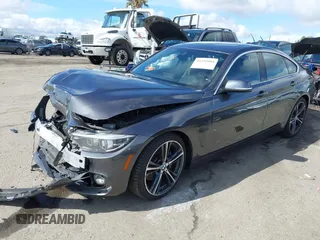 2018 BMW 4 Series 440i with VIN WBA4J5C51JBF07174, listed as a IAAI auction lot 41532904 with 63,745 mi miles and . Bid and sale history available at DreamBid. Image 19.