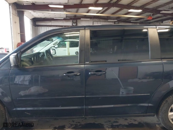 2009 Dodge Grand Caravan SE with VIN 1D8HN44E39B502635, listed as a IAAI auction lot 42003196 with 119,887 mi miles. Bid and sale history available at carsss.com. Image 14.
