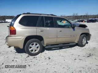 2004 GMC Envoy SLT with VIN 1GKDS13S942169804, listed as a Copart auction lot 47439305 with 240,348 mi miles and Salvage Title. Bid and sale history available at carsss.com. Image 3.