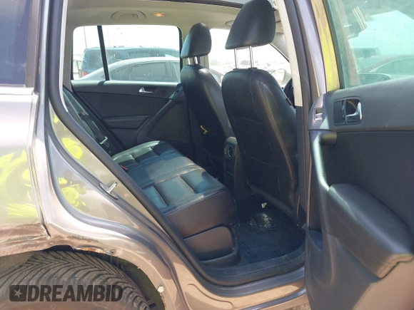 2011 Volkswagen Tiguan SEL w/Premium Navi with VIN WVGAV7AX0BW550059, listed as a IAAI auction lot 42071719 with 107,341 mi miles and . Bid and sale history available at DreamBid. Image 8.