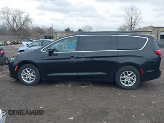 2022 Chrysler Pacifica Touring L with VIN 2C4RC1BG2NR117879, listed as a IAAI auction lot 41845778 with 96,523 mi miles and . Bid and sale history available at DreamBid. Image 14.