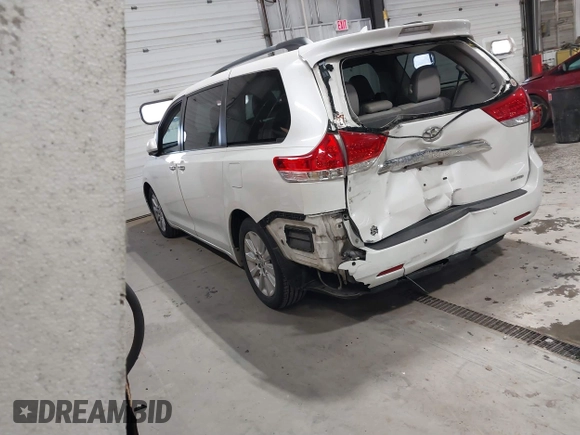 2011 Toyota Sienna XLE AAS with VIN 5TDYK3DC9BS091563, listed as a IAAI auction lot 41393689 with 229,663 mi miles and . Bid and sale history available at DreamBid. Image 3.