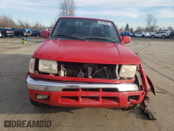 1999 Nissan Frontier XE with VIN 1N6ED26Y2XC312863, listed as a Copart auction lot 42259015 with 212,666 mi miles and Salvage title. Bid and sale history available at DreamBid. Image 5.