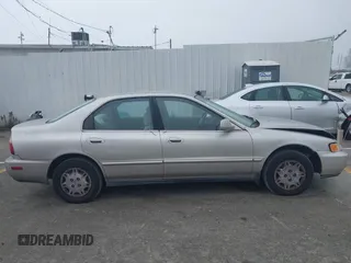 1997 Honda Accord Value with VIN 1HGCD568XVA184006, listed as a IAAI auction lot 41818518 with 276,230 mi miles and . Bid and sale history available at carsss.com. Image 13.