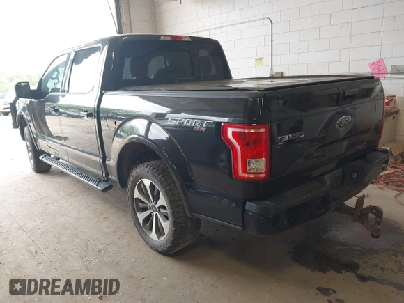 2015 Ford F-150 XLT with VIN 1FTEW1EPXFKE99354, listed as a IAAI auction lot 42245005 with 160,164 mi miles and . Bid and sale history available at DreamBid. Image 3.