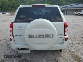 2010 Suzuki Grand Vitara Premium z VIN JS3TD0D24A4100983, wystawiony jako Copart lot #60311295 z przebiegiem 104 455 mil mil oraz Szkoda całkowita • Salvage title. Historia ofert i sprzedaży dostępna na DreamBid. Obrazek 6.