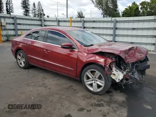 2014 Volkswagen CC Sport with VIN WVWBP7ANXEE506260, listed as a Copart auction lot 54690045 with 154,331 mi miles and Salvage Title. Bid and sale history available at carsss.com. Image 4.
