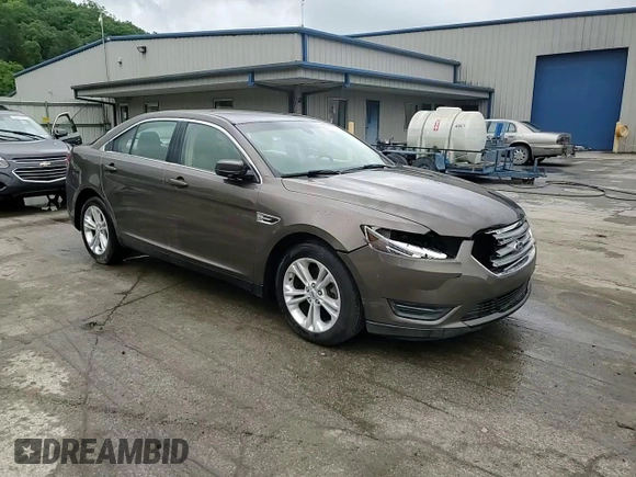 2015 Ford Taurus SEL z VIN 1FAHP2E84FG102075, wystawiony jako Copart lot #59740265 z przebiegiem 90 669 mil mil oraz Szkoda całkowita • Salvage title. Historia ofert i sprzedaży dostępna na DreamBid. Obrazek 13.