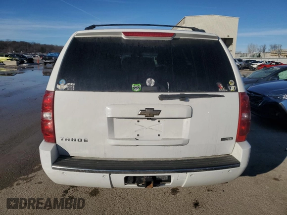 2009 Chevrolet Tahoe LTZ with VIN 1GNFK33099R197350, listed as a Copart auction lot 86149474 with 195,703 mi miles and Salvage title. Bid and sale history available at DreamBid. Image 6.