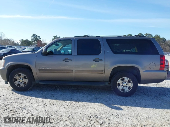 2011 Chevrolet Suburban LT with VIN 1GNSCJE00BR122636, listed as a IAAI auction lot 41594772 with 202,433 mi miles. Bid and sale history available at carsss.com. Image 13.