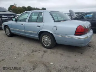 2003 Mercury Grand Marquis GS Convenience with VIN 2MEFM74W63X704603, listed as a Copart auction lot 72118014 with 128,599 mi miles and Clean Title. Bid and sale history available at carsss.com. Image 2.
