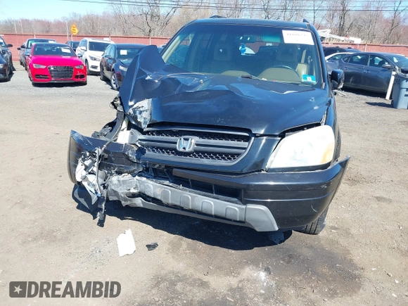 2005 Honda Pilot EX-L with VIN 5FNYF18555B043104, listed as a IAAI auction lot 41888235 with 127,781 mi miles. Bid and sale history available at carsss.com. Image 6.