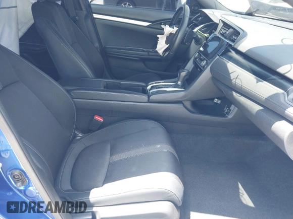 2021 Honda Civic Sport with VIN 2HGFC2F80MH527517, listed as a IAAI auction lot 42020871 with 36,058 mi miles and . Bid and sale history available at DreamBid. Image 5.