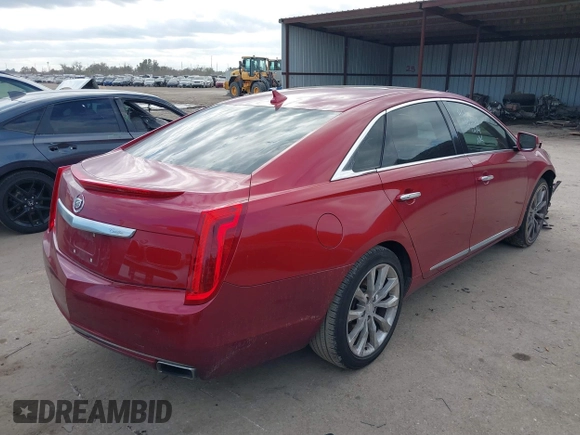 2013 Cadillac XTS Luxury with VIN 2G61P5S32D9143521, listed as a IAAI auction lot 41167887 with 193,347 mi miles and . Bid and sale history available at carsss.com. Image 4.