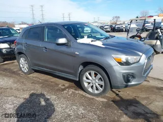 2014 Mitsubishi Outlander Sport ES with VIN 4A4AP3AU1EE010056, listed as a IAAI auction lot 41799311 with 173,269 mi miles. Bid and sale history available at carsss.com. Image 1.