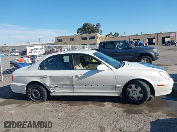2002 Hyundai Sonata with VIN KMHWF25S92A571901, listed as a IAAI auction lot 41404038 with 133,316 mi miles. Bid and sale history available at carsss.com. Image 13.