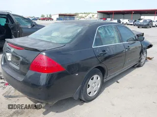 2007 Honda Accord LX with VIN 3HGCM56467G710441, listed as a IAAI auction lot 42054596 with 241,471 mi miles and . Bid and sale history available at DreamBid. Image 4.