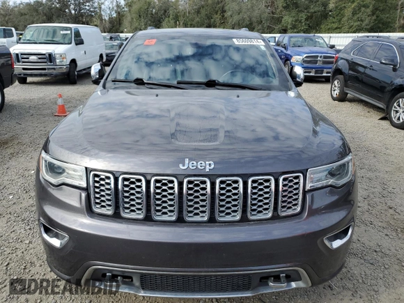 2021 Jeep Grand Cherokee Overland with VIN 1C4RJFCG9MC620320, listed as a Copart auction lot 85609814 with 61,335 mi miles and Salvage title. Bid and sale history available at DreamBid. Image 5.