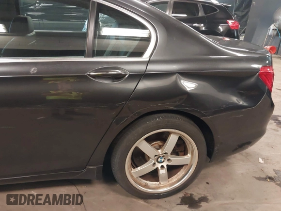 2011 BMW 7 Series 750Li xDrive with VIN WBAKC8C56BC433083, listed as a IAAI auction lot 42523890 with 120,977 mi miles and . Bid and sale history available at DreamBid. Image 6.