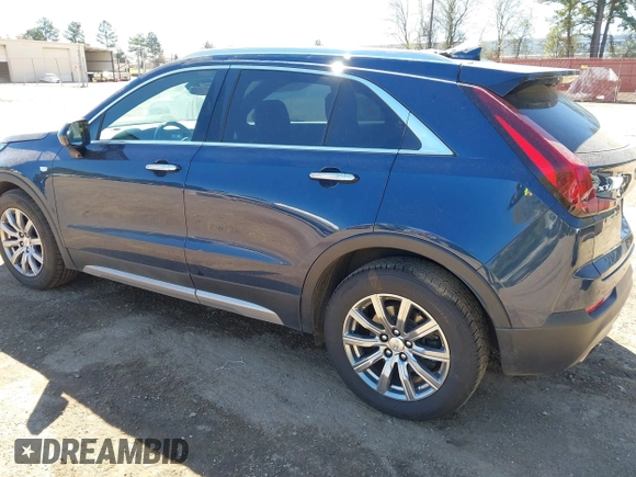 2019 Cadillac XT4 FWD Premium Luxury z VIN 1GYFZCR47KF109394, wystawiony jako IAAI lot #41864606 z przebiegiem 98 425 mil mil oraz . Historia ofert i sprzedaży dostępna na DreamBid. Obrazek 3.