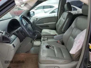 2006 Honda Odyssey EX-L z VIN 5FNRL38786B014188, wystawiony jako Copart lot #57140935 z przebiegiem Nie podano mil oraz Szkoda całkowita • Salvage title. Historia ofert i sprzedaży dostępna na DreamBid. Obrazek 7.