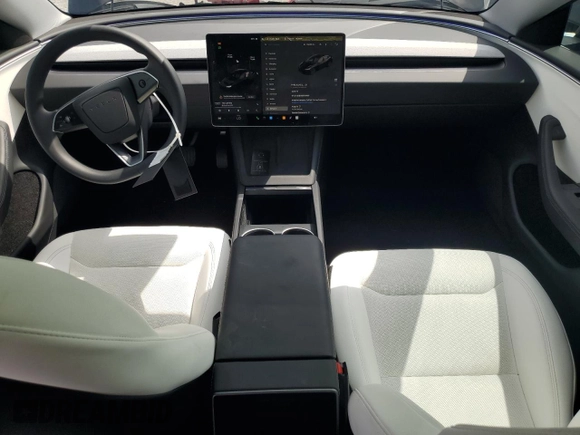 2025 Tesla Model 3 Long Range with VIN 5YJ3E1EA8SF984931, listed as a Copart auction lot 61259345 with 2,248 mi miles and Salvage title. Bid and sale history available at DreamBid. Image 8.