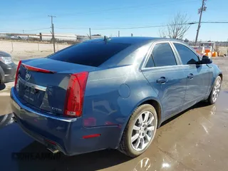 2009 Cadillac CTS RWD with VIN 1G6DV57V990146995, listed as a IAAI auction lot 41209631 with 172,229 mi miles and . Bid and sale history available at carsss.com. Image 4.