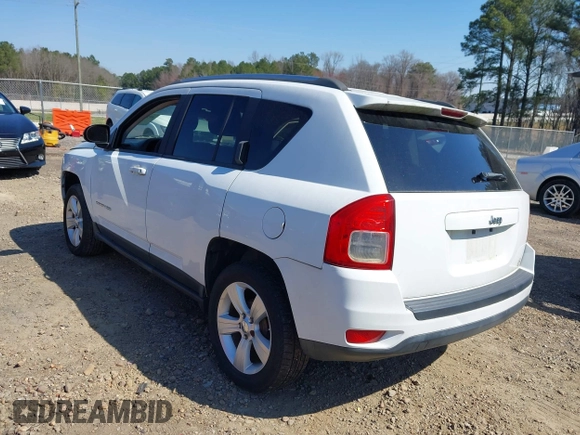 2012 Jeep Compass Sport with VIN 1C4NJCBA1CD660068, listed as a IAAI auction lot 41766146 with 173,445 mi miles. Bid and sale history available at carsss.com. Image 3.