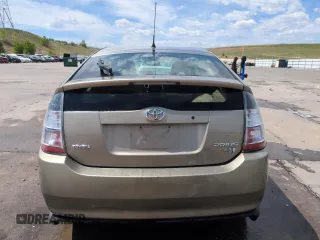 2005 Toyota Prius z VIN JTDKB20U453074321, wystawiony jako Copart lot #58217285 z przebiegiem 299 999 mil mil oraz Szkoda całkowita • Salvage title. Historia ofert i sprzedaży dostępna na DreamBid. Obrazek 6.