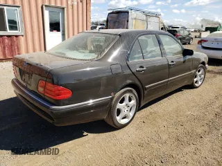 1999 Mercedes-Benz E-Class with VIN WDBJF70H6XA758770, listed as a Copart auction lot 70312094 with 0 mi miles and Salvage Title. Bid and sale history available at carsss.com. Image 3.