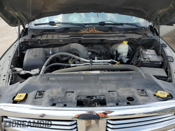 2015 Ram 1500 Lone Star z VIN 1C6RR6LT6FS590618, wystawiony jako Copart lot #51655435 z przebiegiem 207 594 mil mil oraz Szkoda całkowita • Salvage title. Historia ofert i sprzedaży dostępna na DreamBid. Obrazek 11.