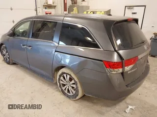 2014 Honda Odyssey EX-L with VIN 5FNRL5H67EB056983, listed as a IAAI auction lot 42318699 with 256,267 mi miles and . Bid and sale history available at DreamBid. Image 3.