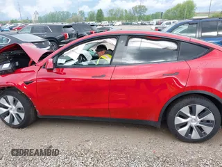 2021 Tesla Model Y Long Range z VIN 5YJYGDEE3MF173321, wystawiony jako IAAI lot #42163343 z przebiegiem 46 569 mil mil oraz . Historia ofert i sprzedaży dostępna na DreamBid. Obrazek 15.