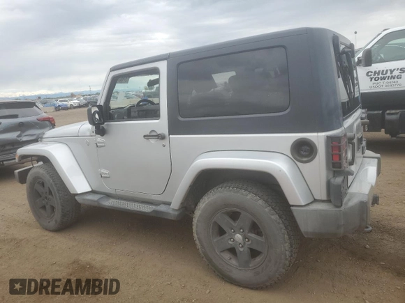 2010 Jeep Wrangler Sahara z VIN 1J4GA5D18AL182858, wystawiony jako Copart lot #57601695 z przebiegiem Nie podano mil oraz Czysty tytuł • Clean title. Historia ofert i sprzedaży dostępna na DreamBid. Obrazek 2.