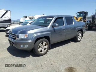 2009 Honda Ridgeline RTL with VIN 5FPYK16549B106222, listed as a Copart auction lot 52180955 with 193,510 mi miles and Salvage Title. Bid and sale history available at carsss.com. Image 1.