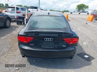 2012 Audi A7 Premium Plus with VIN WAUYGAFC0CN087604, listed as a IAAI auction lot 42747927 with 155,662 mi miles and . Bid and sale history available at DreamBid. Image 16.